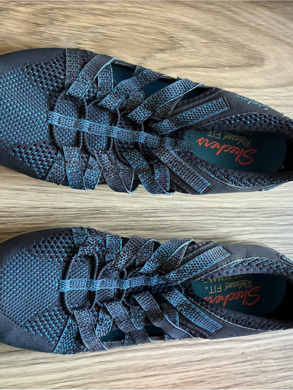 Skechers women's Blue Athletic Sneakers with Teal Stitching